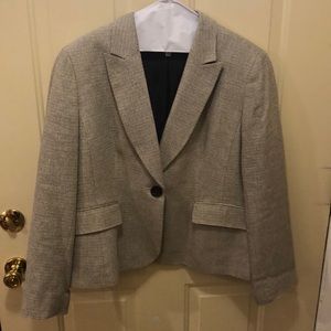 White blazer, some brown tint to it